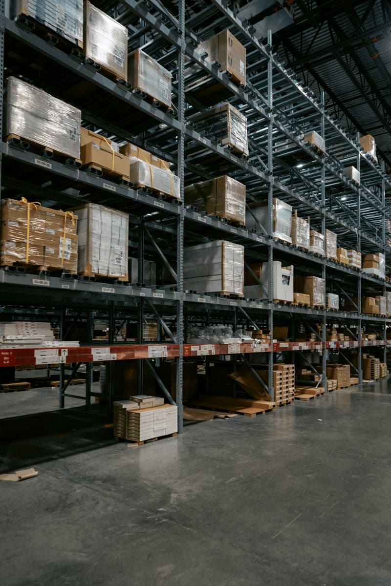 Warehouse aisle with stocked pallet racks